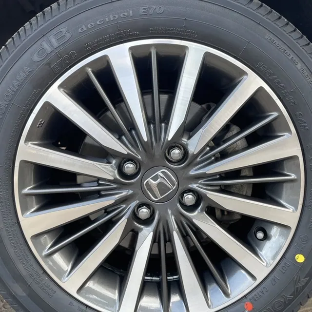 After repair wheel installed on car showing finished rim